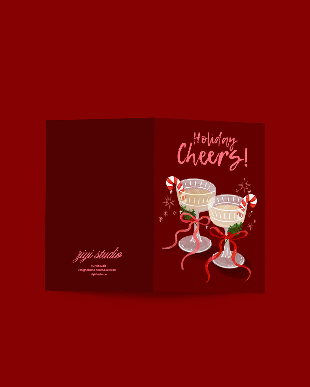 Holiday-themed card with two cocktails, candy canes, and 'Holiday Cheers!' text on a red background.