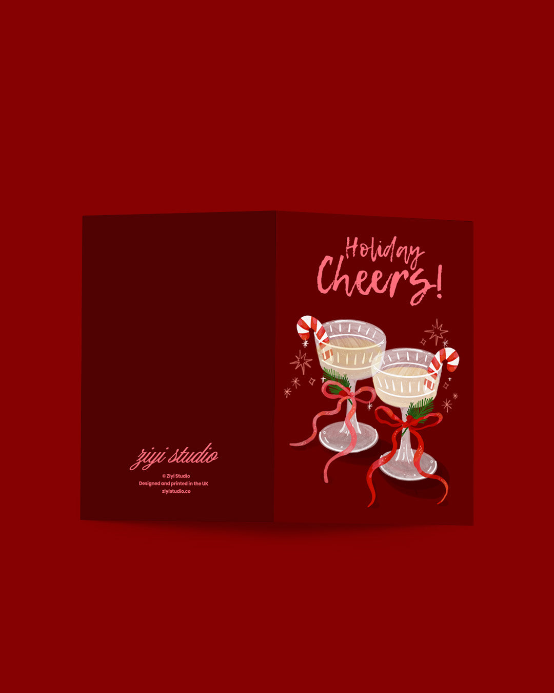 Holiday-themed card with two cocktails, candy canes, and 'Holiday Cheers!' text on a red background.