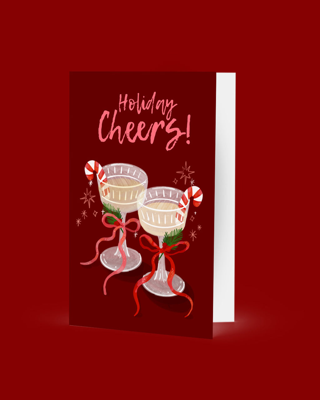 Greeting card with 'Holiday Cheers!' text and festive cocktails on a red background