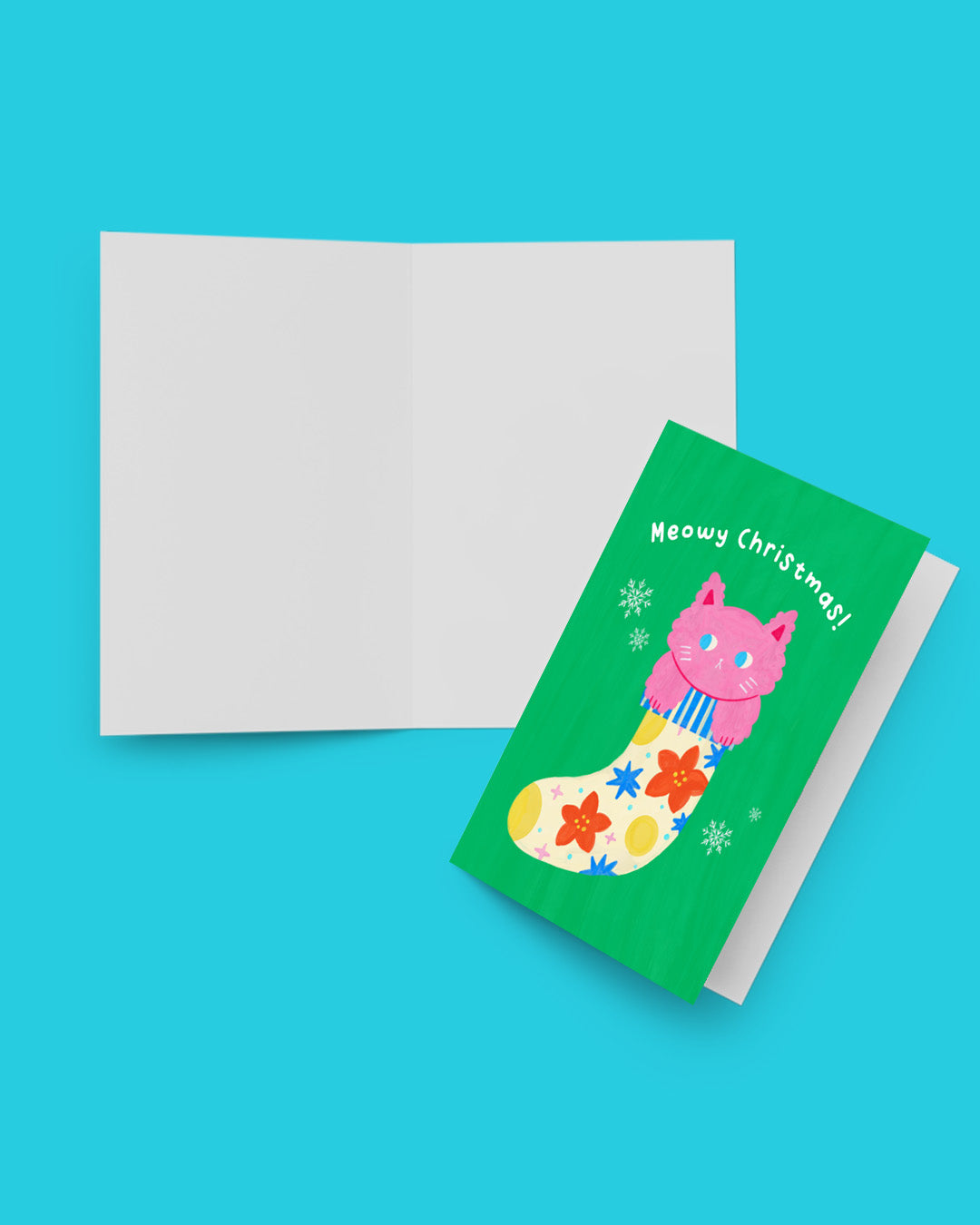 Meowy Christmas card open showing blank white inside pages