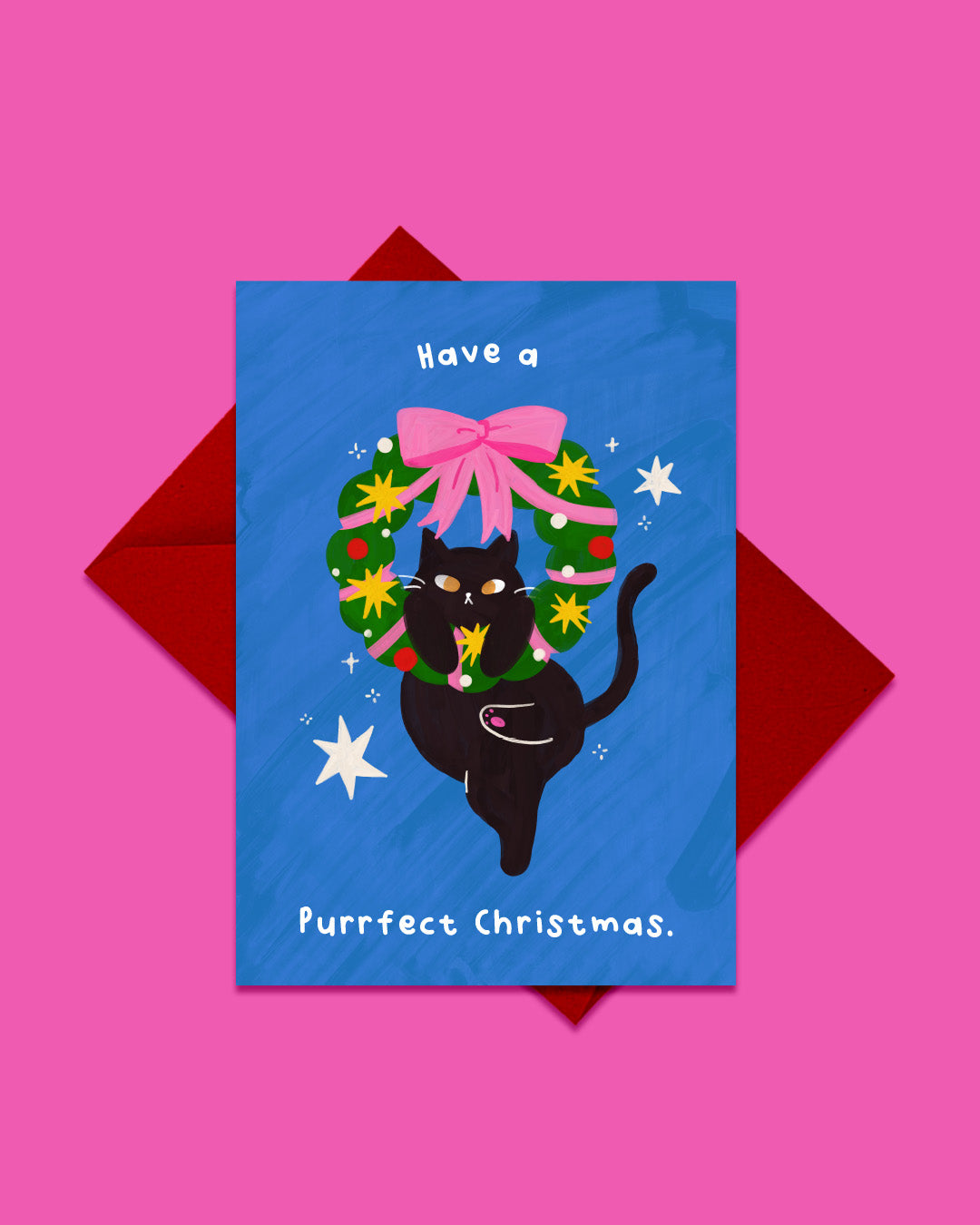 Have a Purrfect Christmas greeting card with red envelope, black cat and wreath design by London artist