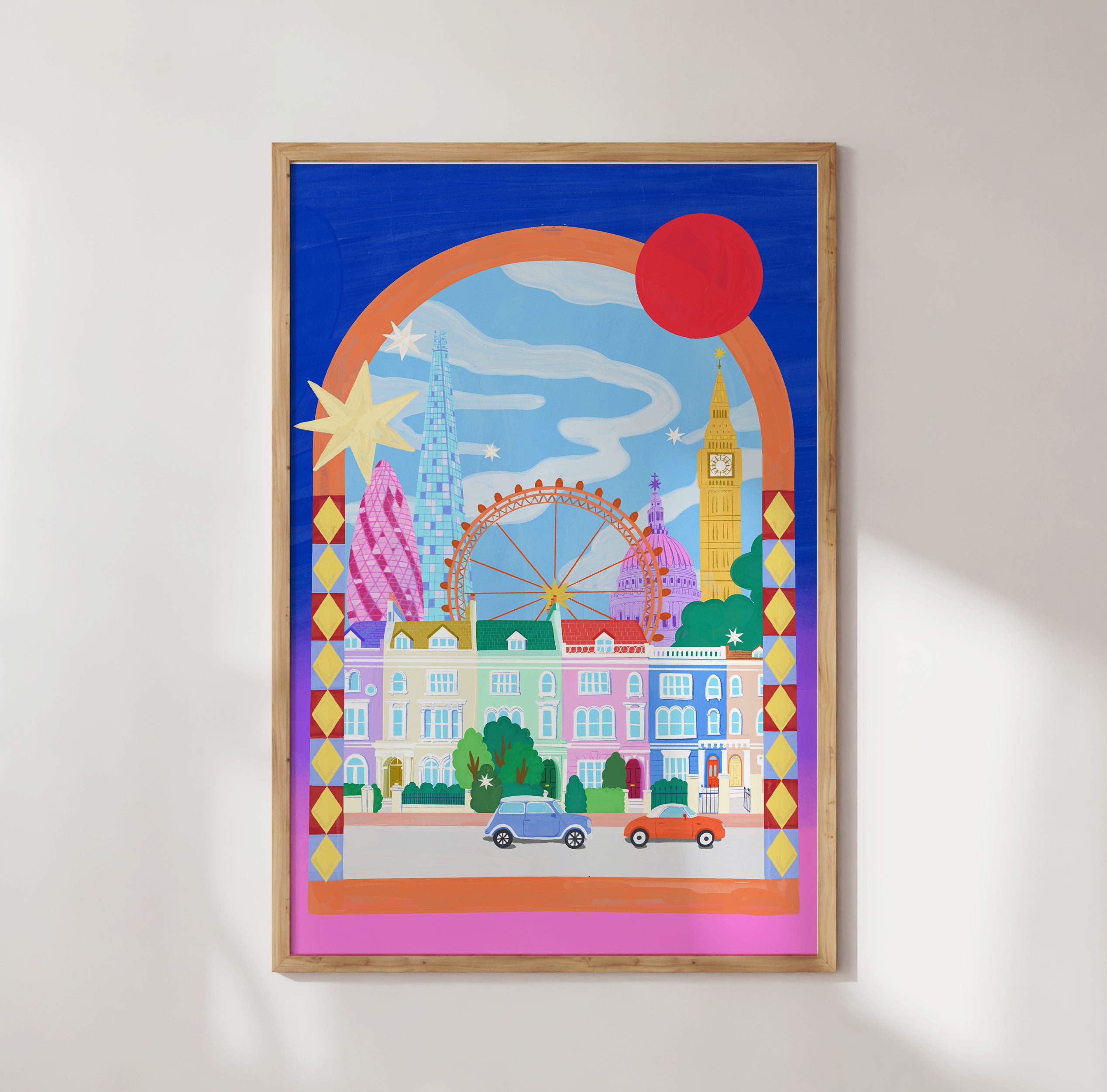 Colorful cityscape illustration with landmarks framed on a white wall
