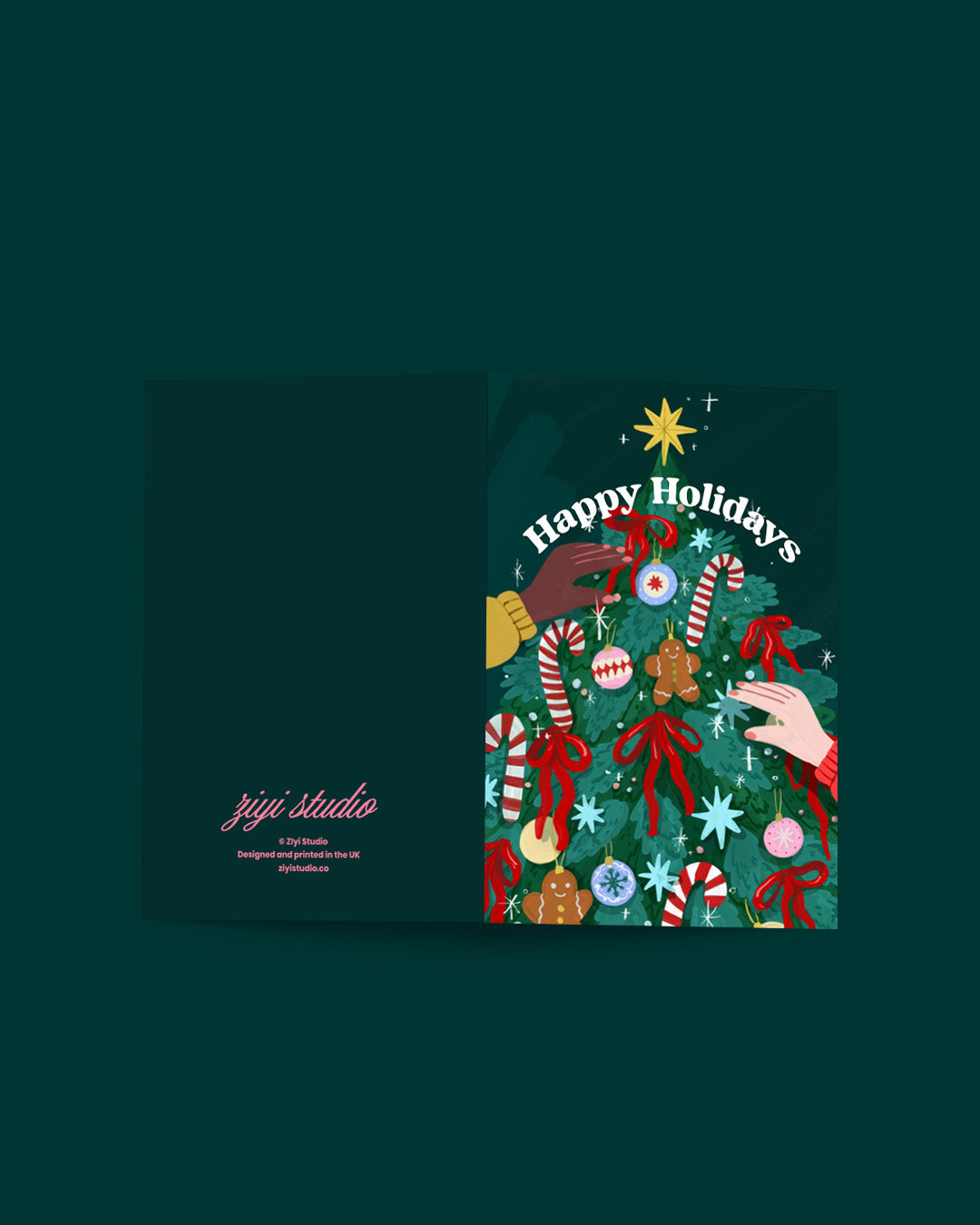 Holiday-themed product packaging with Christmas tree design and 'Happy Holidays' text on a dark green background.