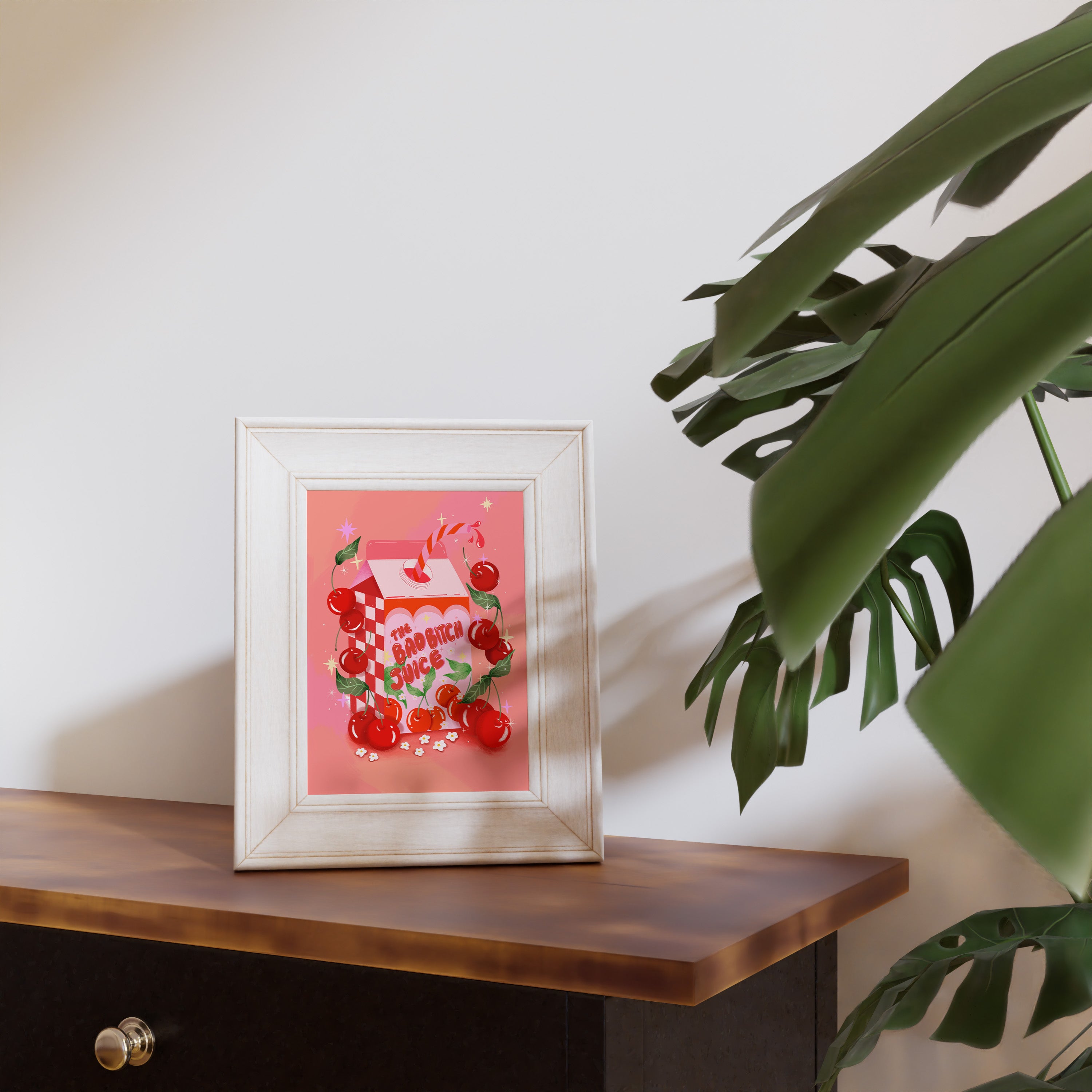 Retro-style art print titled “The Bad Bitch Juice,” featuring bold red and pink tones with sassy, confident vibes. Designed by Ziyi Studio for bold interior spaces.