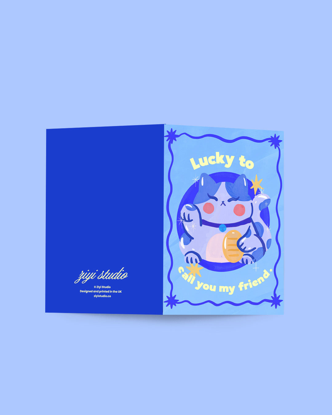 Greeting card with cartoon character and text 'Lucky to call you my friend' on a blue background