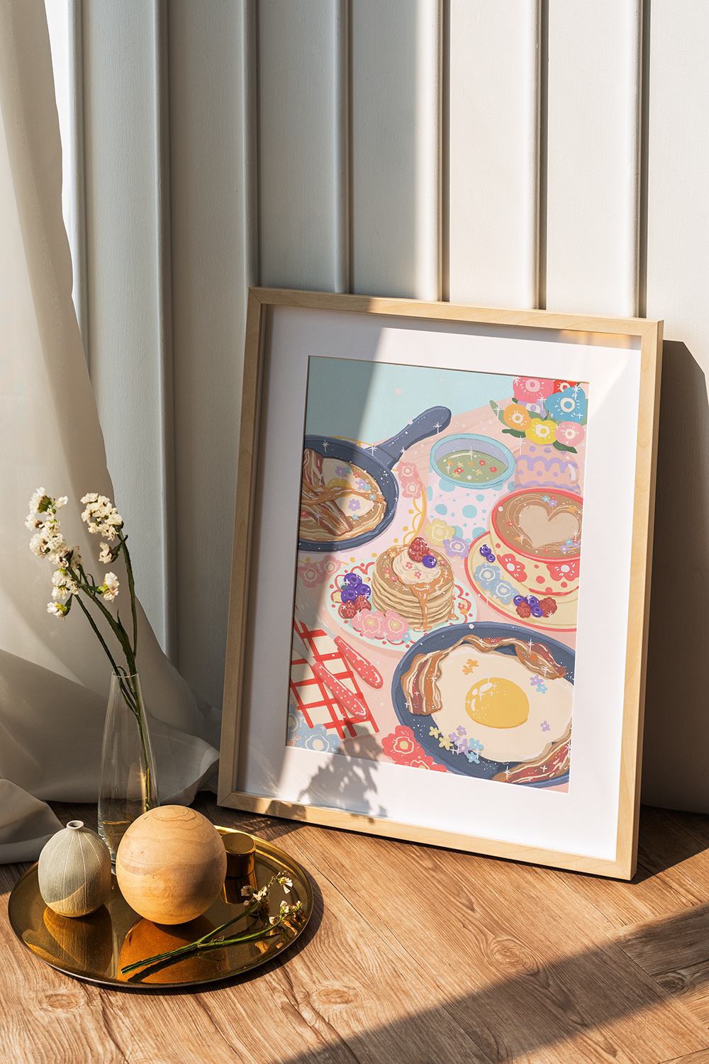 Illustrated art print of a whimsical breakfast scene with pancakes, bacon, eggs, coffee, green tea, berries, and floral details. Cozy brunch vibe by Ziyi Studio.