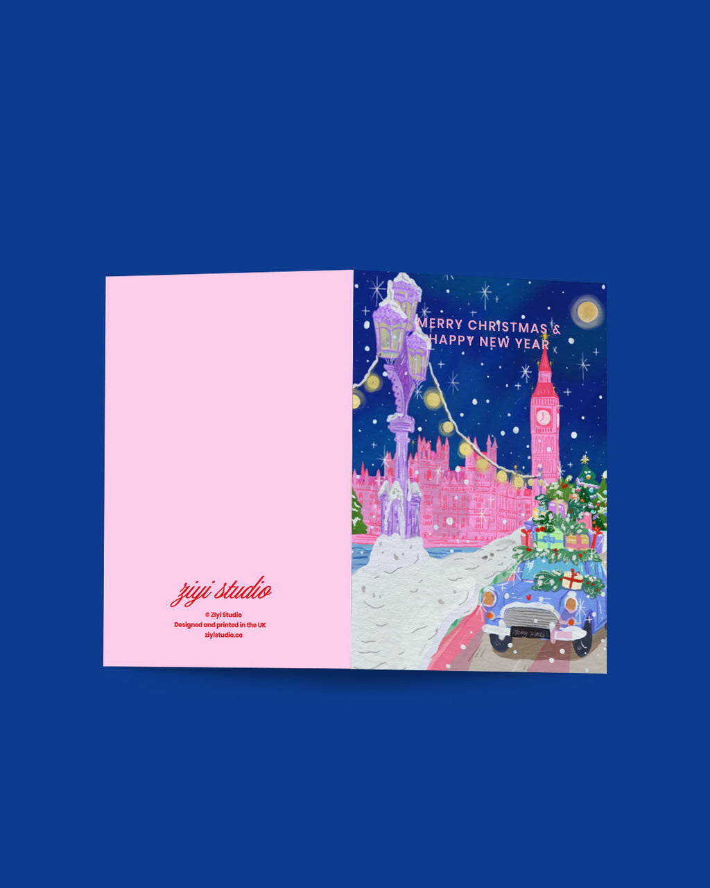 Card with festive design featuring a cityscape and Christmas elements on a blue background