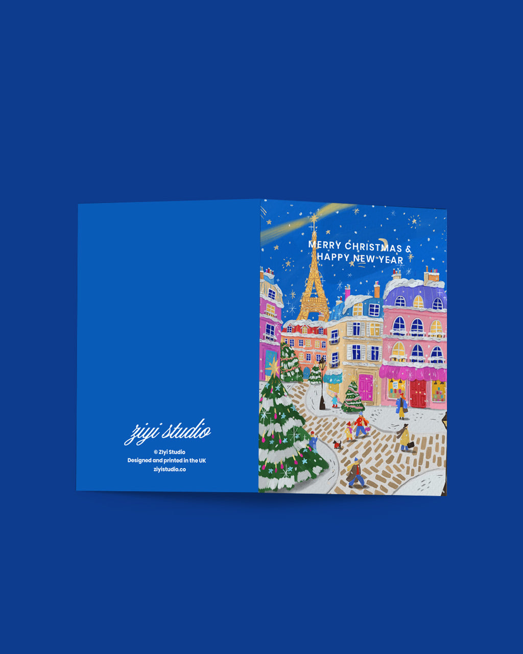 Christmas card with a snowy town scene and 'Merry Christmas & Happy New Year' text, featuring the zyi studio logo.
