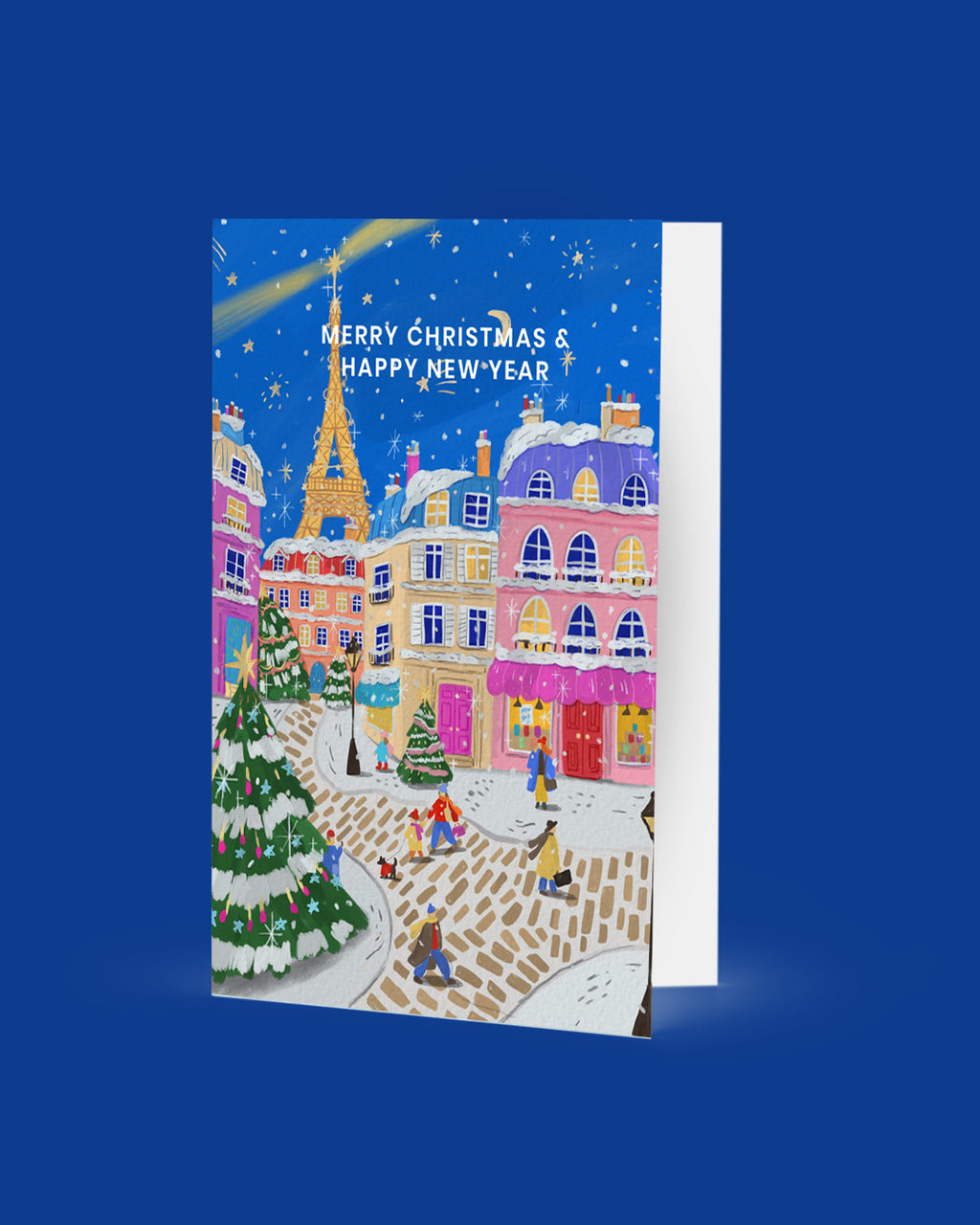 Christmas card with a festive town scene and 'Merry Christmas & Happy New Year' text on a blue background.