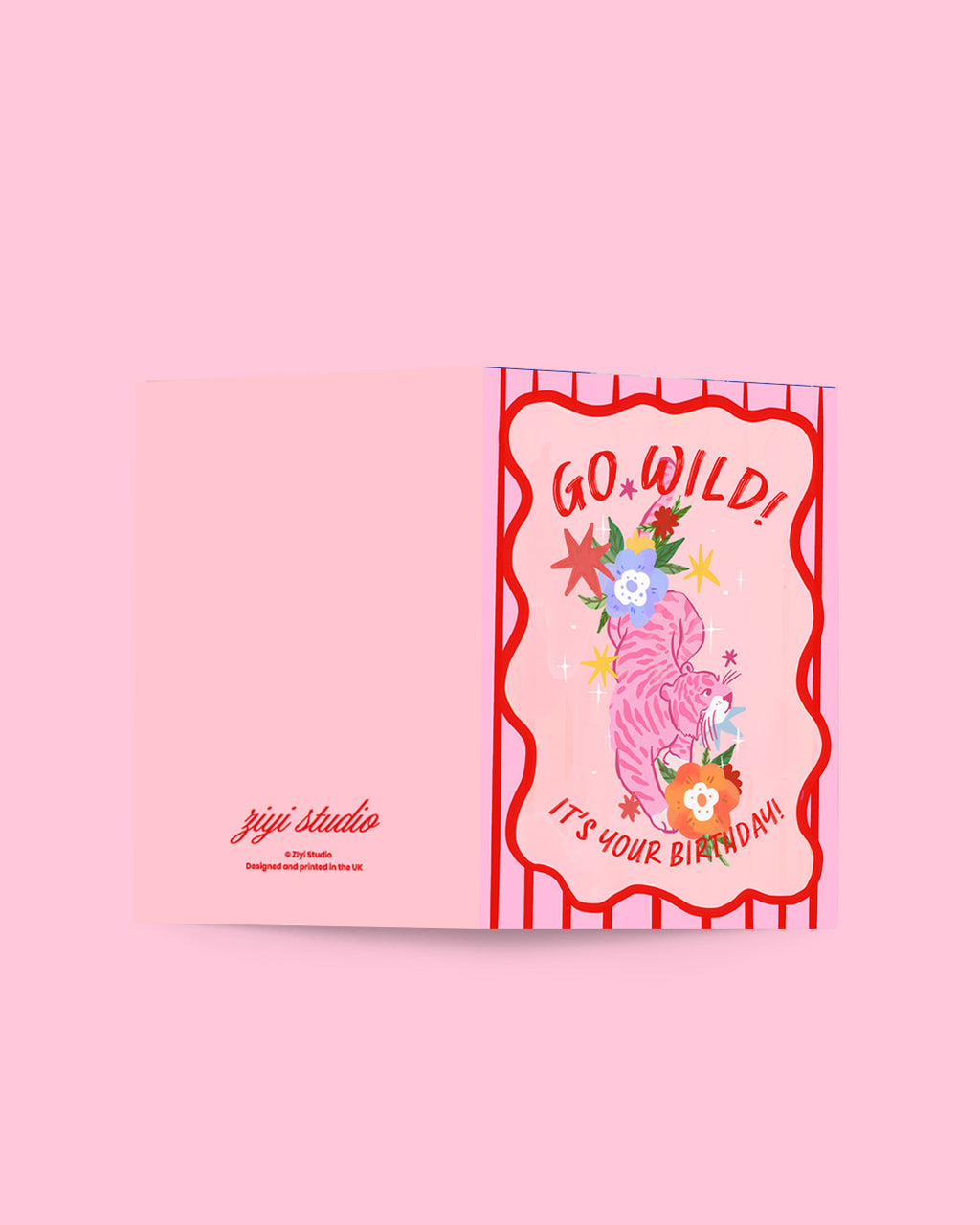 Card with a zebra illustration and 'Go Wild! It's Your Birthday!' text on a pink background