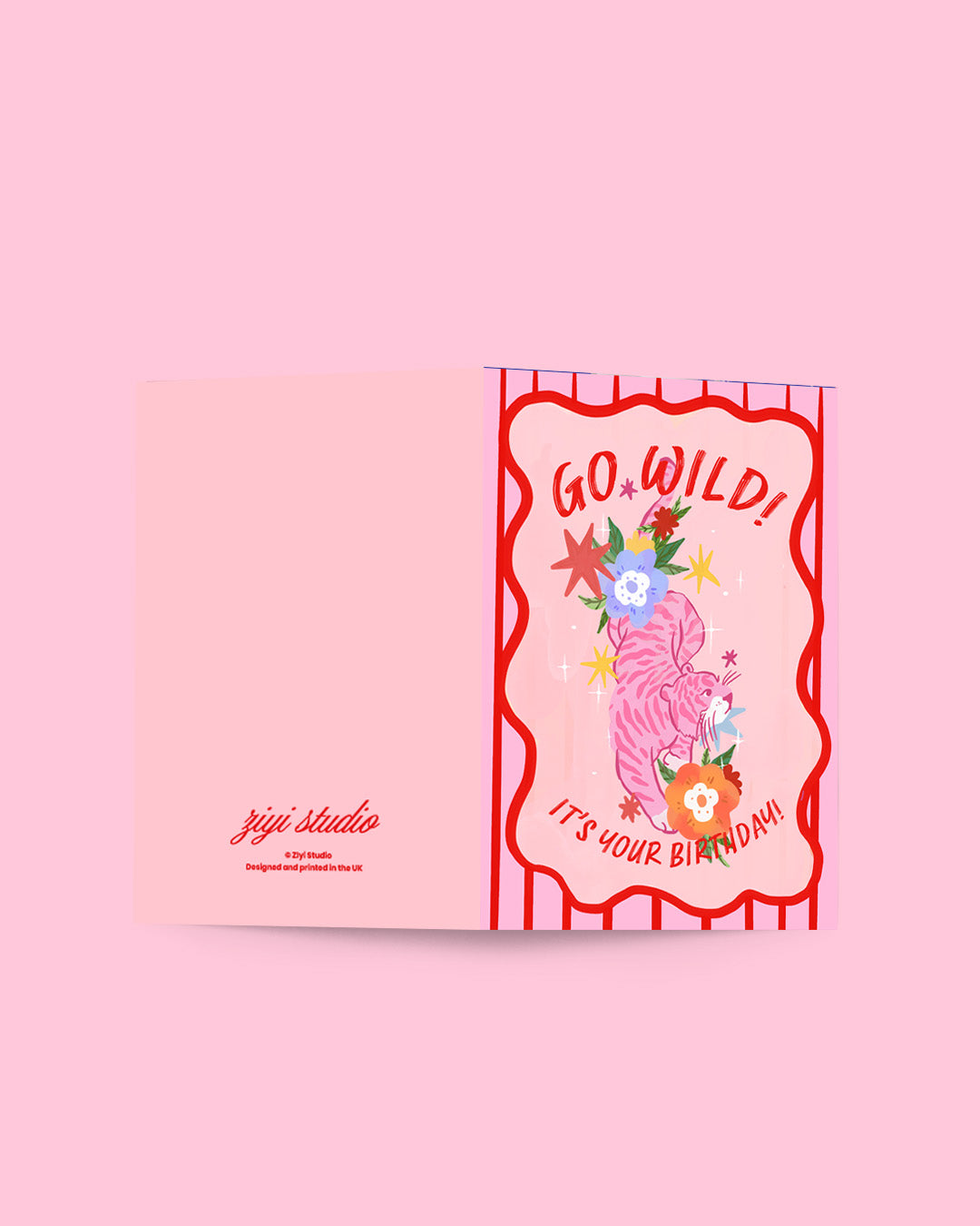 Card with a zebra illustration and 'Go Wild! It's Your Birthday!' text on a pink background