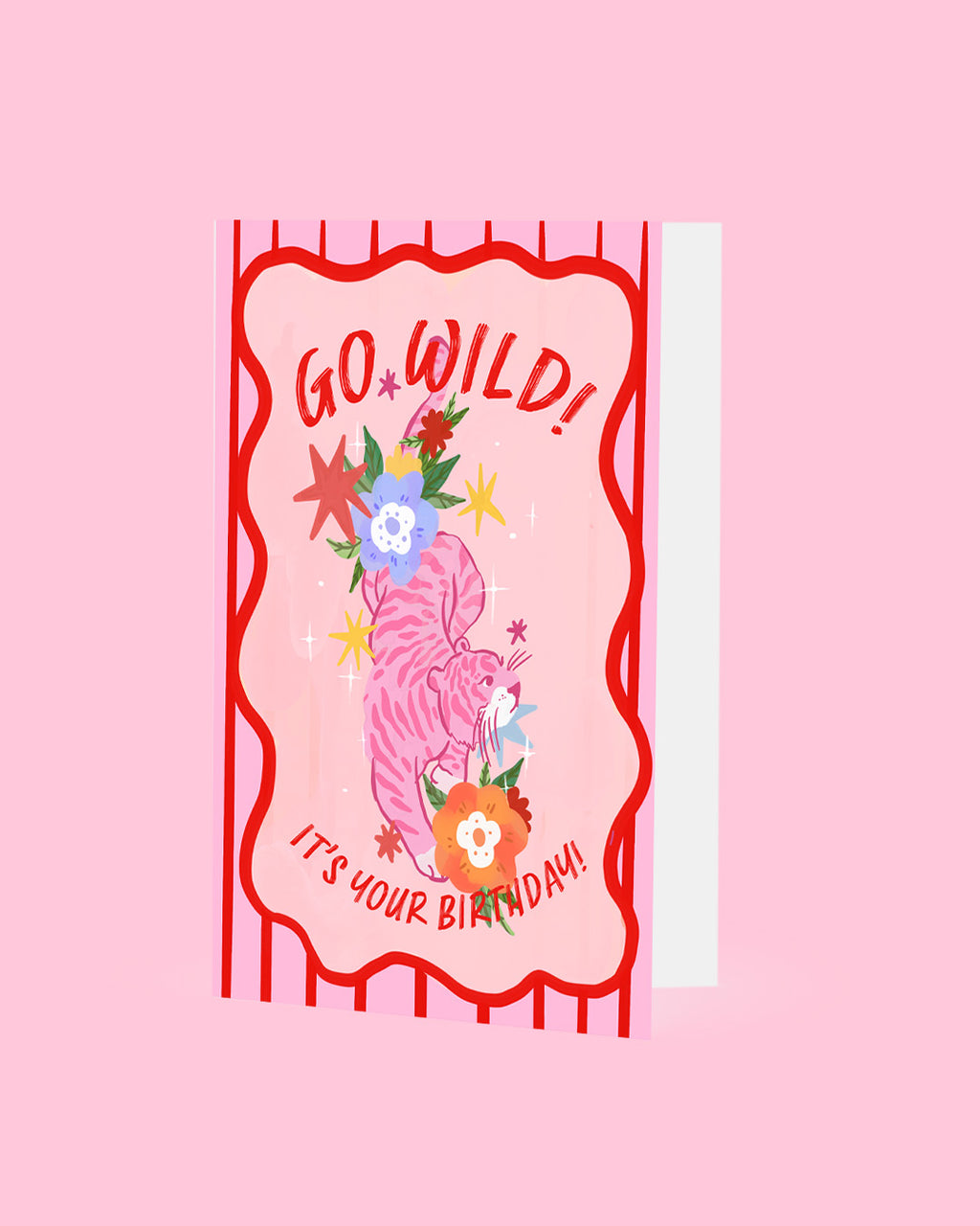 Pink birthday card with 'Go Wild! It's Your Birthday!' text and floral design on a pink background
