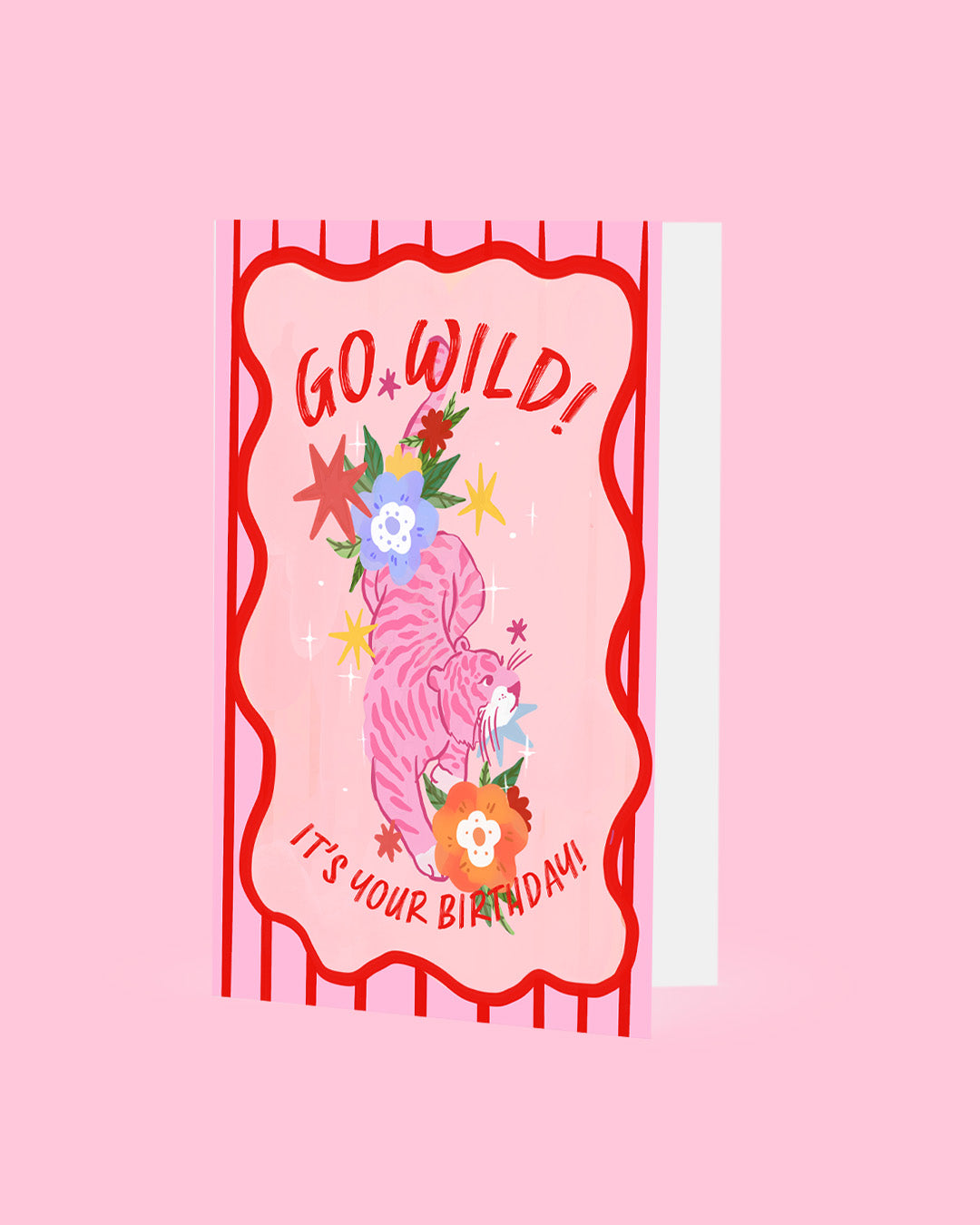 Pink birthday card with 'Go Wild! It's Your Birthday!' text and floral design on a pink background