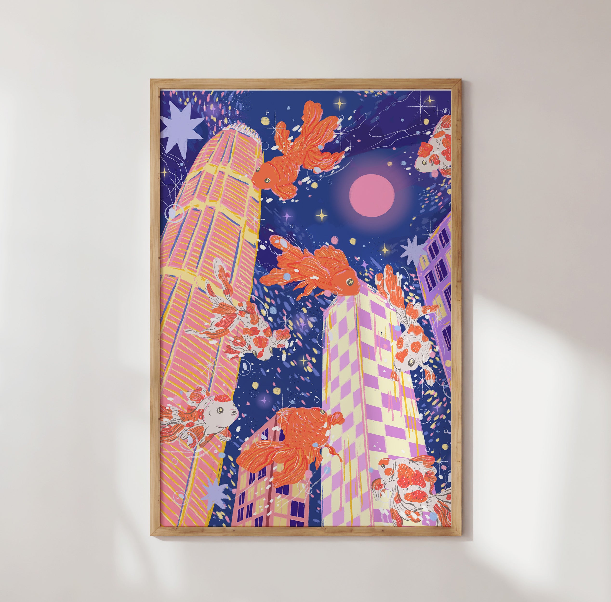 Whimsical goldfish illustration in framed print – Hong Kong skyline at night