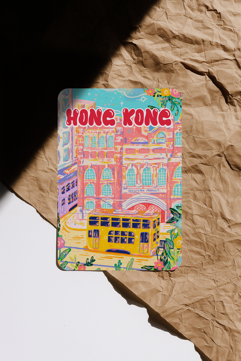 Western Market Hong Kong postcard featuring red-brick heritage building and yellow tram in colourful illustration.