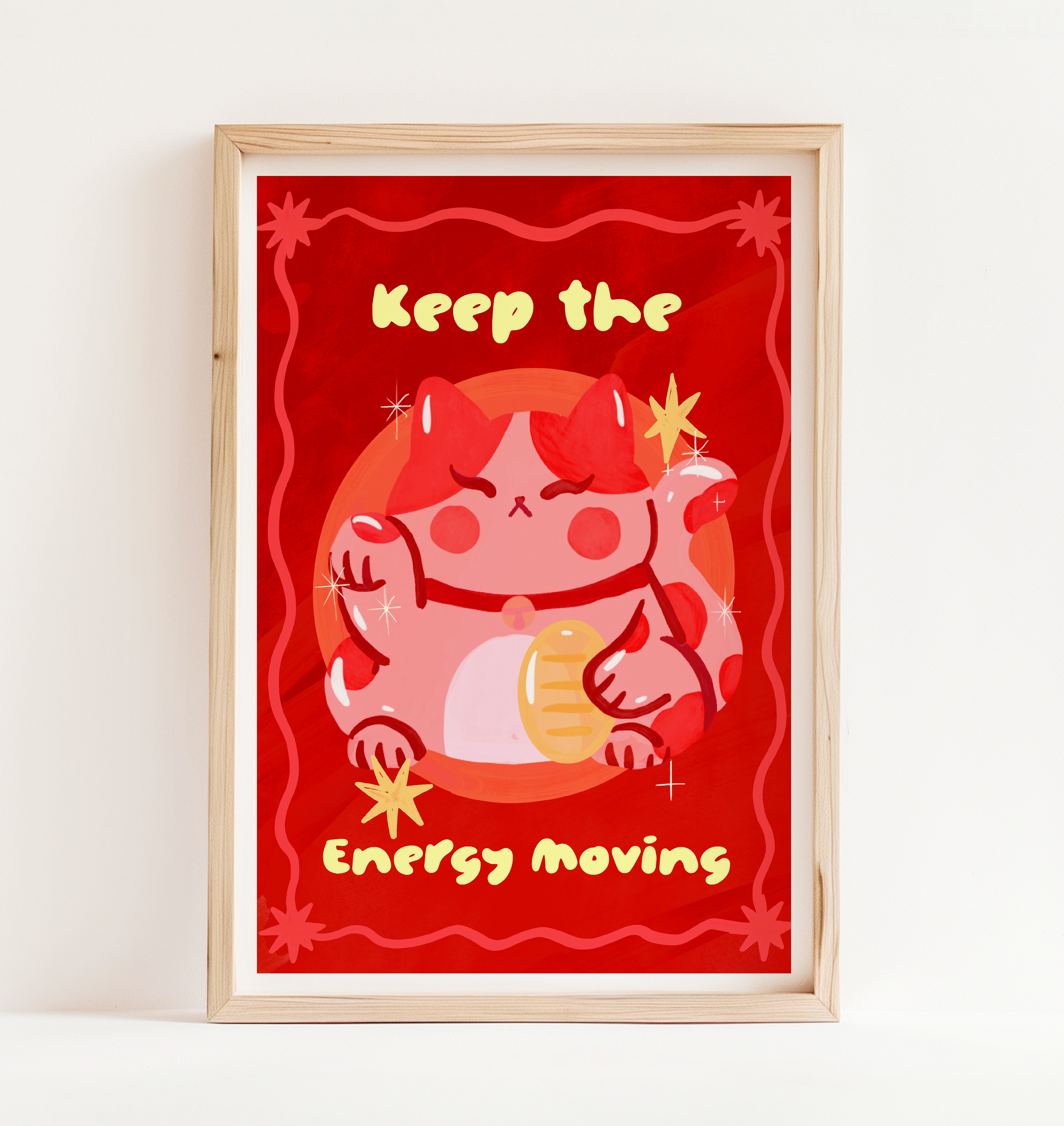 Framed poster with a cartoon character and text 'Keep the Energy Moving' on a red background.