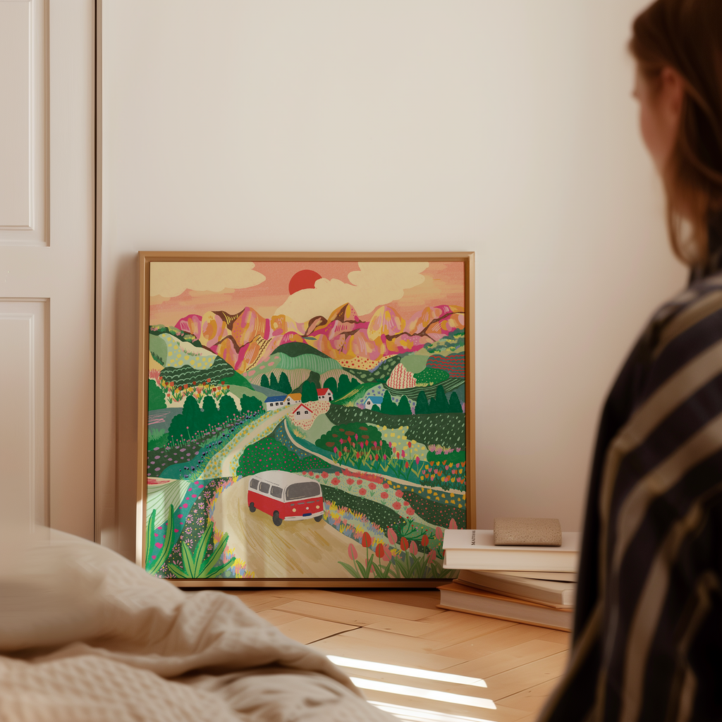 Let's Go On A Trip travel art print displayed on bedroom floor with books, colourful campervan landscape by Ziyi StudioLet's Go On A Trip travel art print displayed on bedroom floor with books, colourful campervan landscape by Ziyi Studio