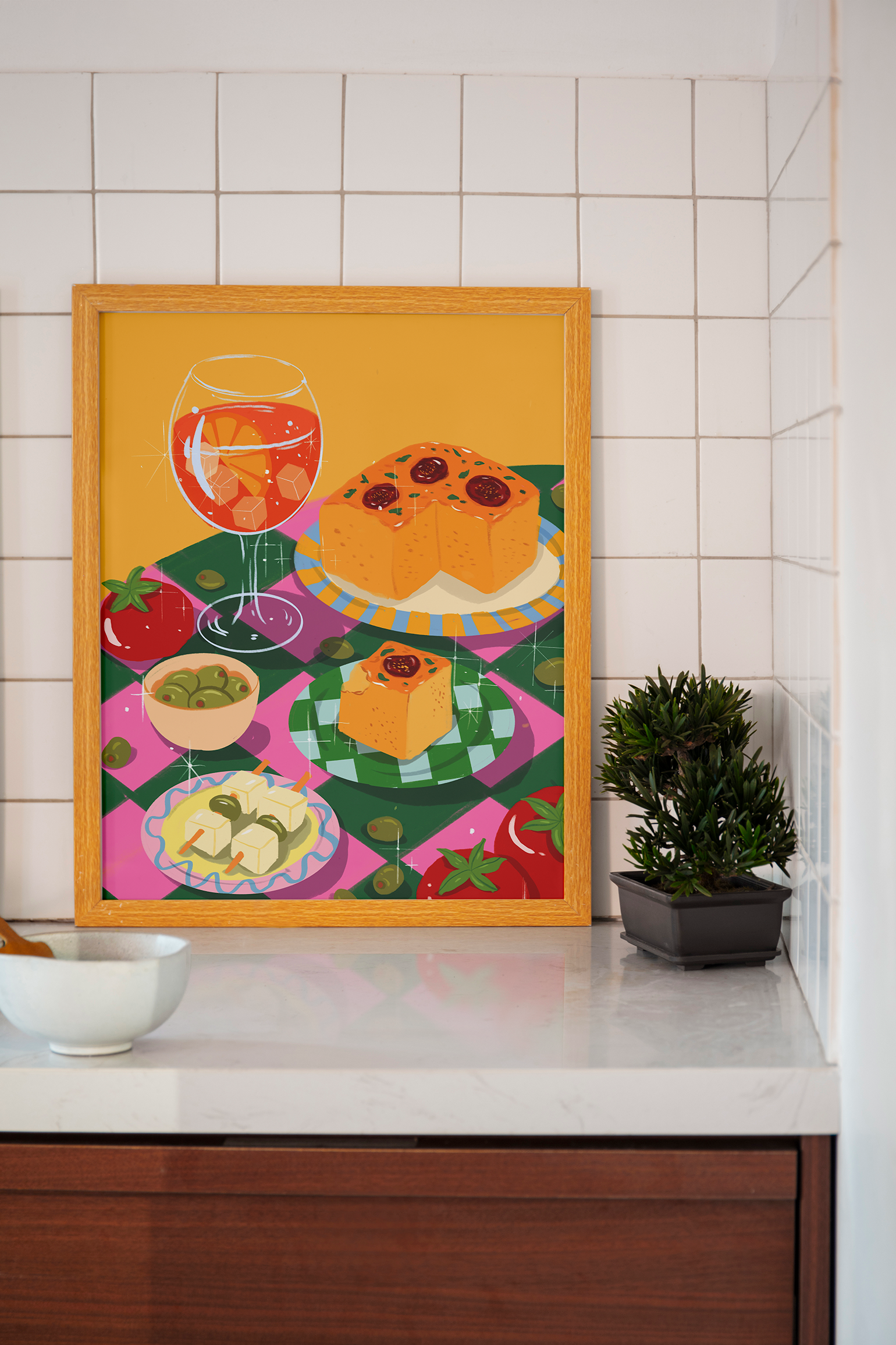 Art print featuring Mediterranean focaccia, Aperol spritz, olives, and tomatoes in a colorful picnic-style setting. Illustration by Ziyi Studio.