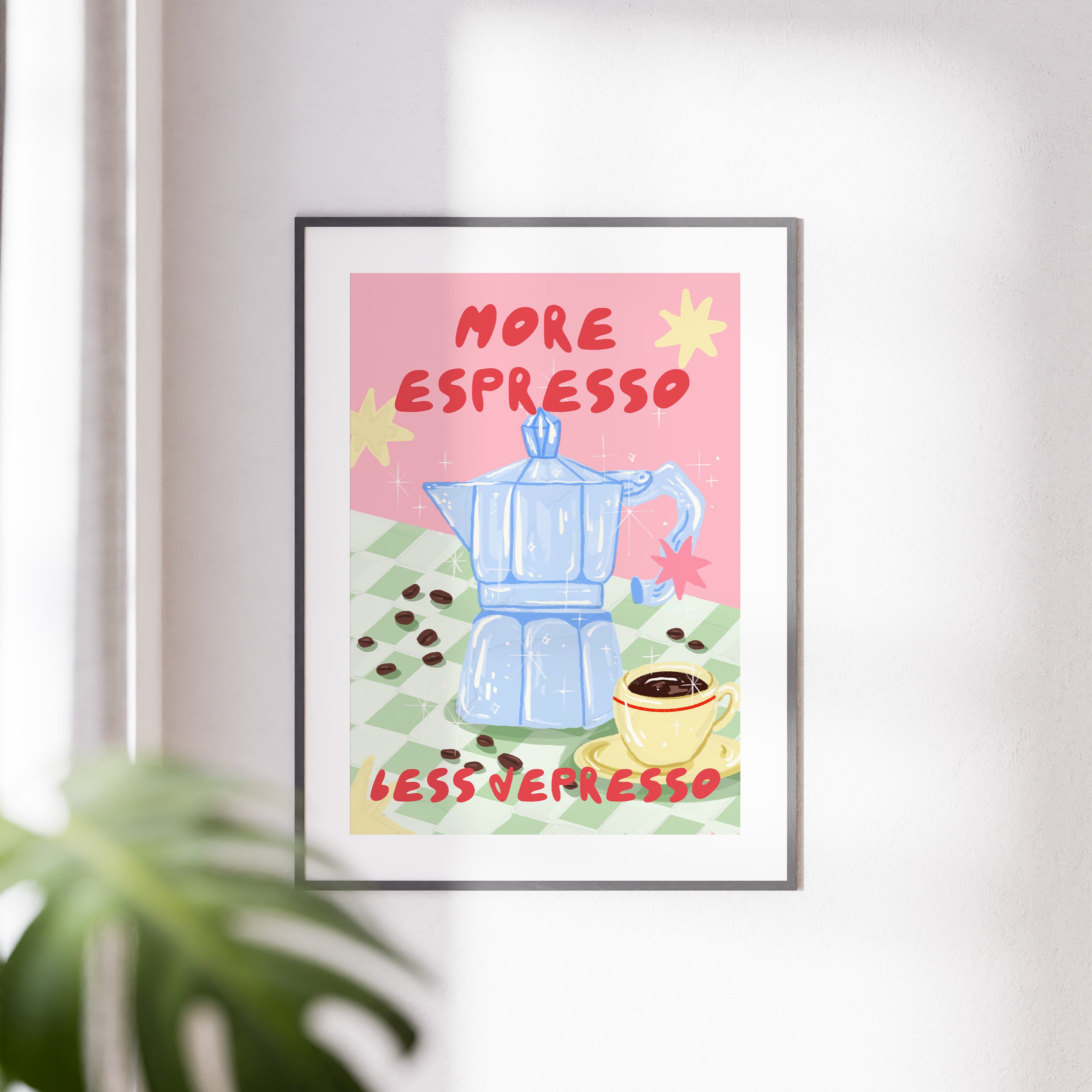 Full frontal framed coffee print leaning against wall with decorative props
