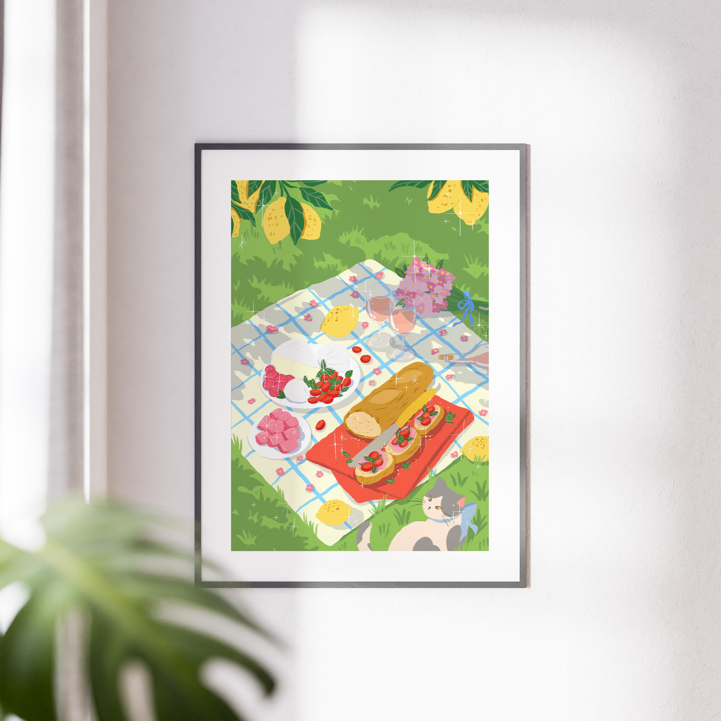 Art print of an Italian-style picnic under lemon trees featuring wine, cheese, tomatoes, and a cat resting in the grass. Bright summer garden vibe by Ziyi Studio.