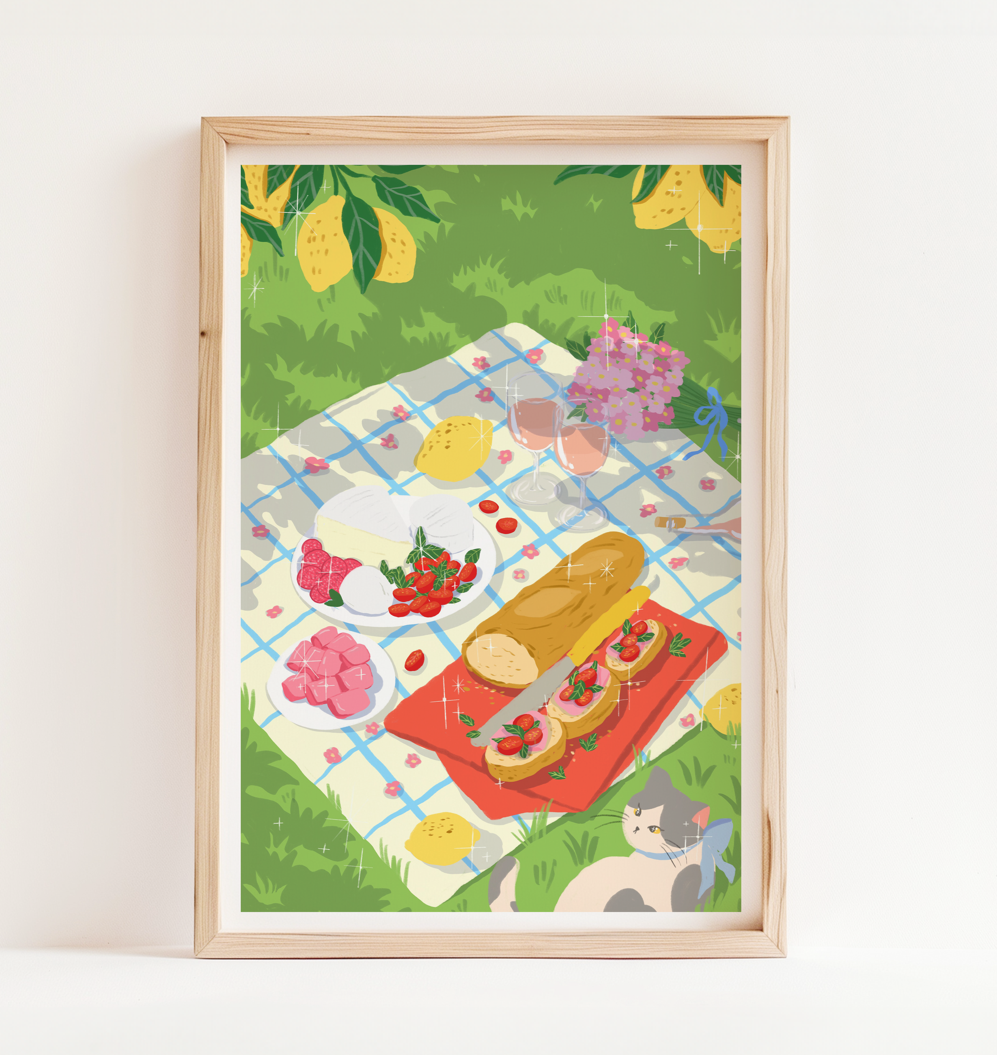 Art print of an Italian-style picnic under lemon trees featuring wine, cheese, tomatoes, and a cat resting in the grass. Bright summer garden vibe by Ziyi Studio.