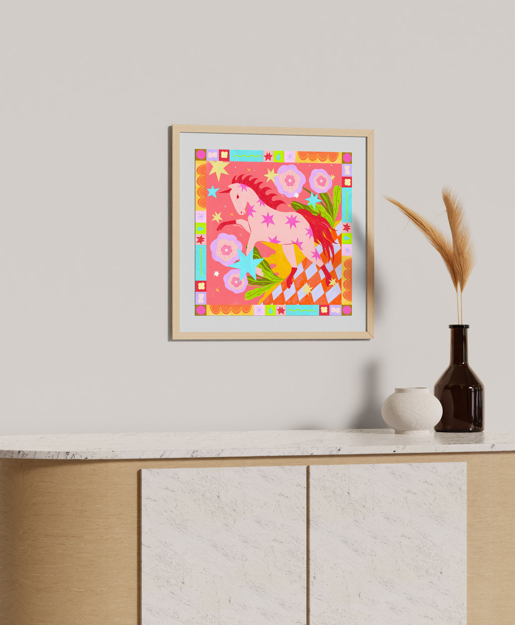 Vibrant folk art print of pink horse with decorative pattern border in white frame, maximalist wall decor