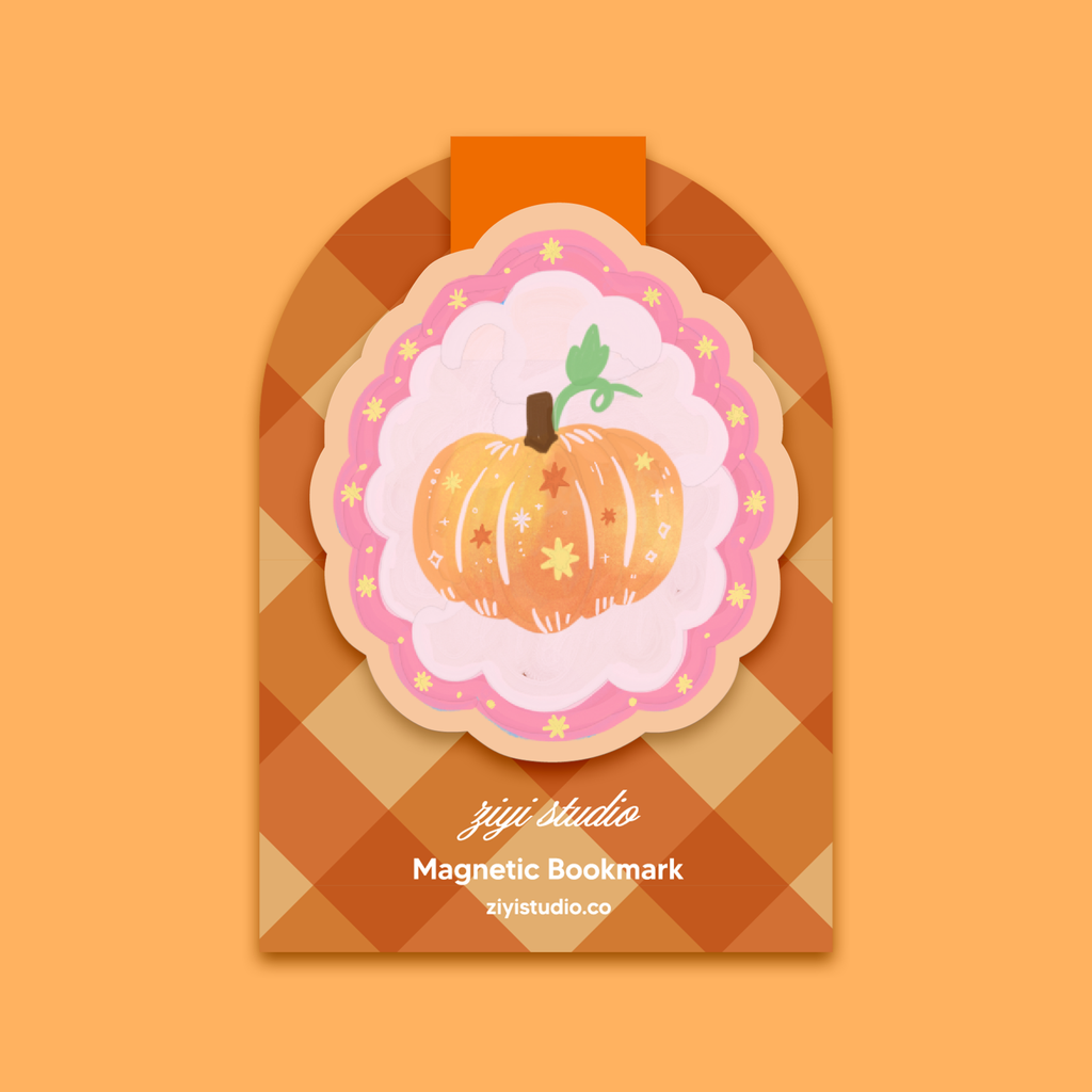 Magnetic bookmark with pumpkin design on a checkered background, featuring ziyi studio branding.