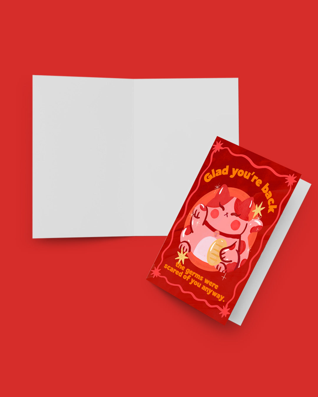 Red greeting card with cartoon character and white envelope on a red background